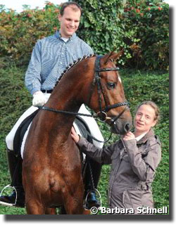 a six and a half months pregnant wert. Stable rider Matthias Bouton on one of Werth's new youngsters, Boston (by Jazz). Owned by a British couple