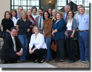 Members of nine North American warmblood registries participated in a highly productive round table meeting March 5 in Tulsa which was moderated by Silver Creek Farms, Broken Arrow, Oklahoma. L-R standing: Christine McCarthy and Lana Sneddon (KWPN of North America), Ernie Cohn (Rheinland Pfalz-Saar International), Holly Simensen (Oldenburg Horse Breeders' Association), Kathy St. Martin (Belgian Warmblood Breeding Association), Jo Ann Cohn (RPSI), Jos Mottershead (Canadian Sport Horse Association), Ronda Stavisky (BWP/NAD), Maggie Sjoberg (American Holsteiner Horse Association), Suzanne Quarles (Chair AHS Mare and Stallion Committee), Barbara Sikkink (Manager, Silver Creek Farms), Ken Heineken (AHHA), Carol Reid (Swedish Warmblood Association of North America), Helmut Schrant (ISR/Oldenburg N.A.) and Hugh Bellis-Jones (AHS Executive Director). Kneeling front: Harald Hoffman (Training Director 30-Day Test) and Summer Stoffel (President, Silver Creek Farms). 